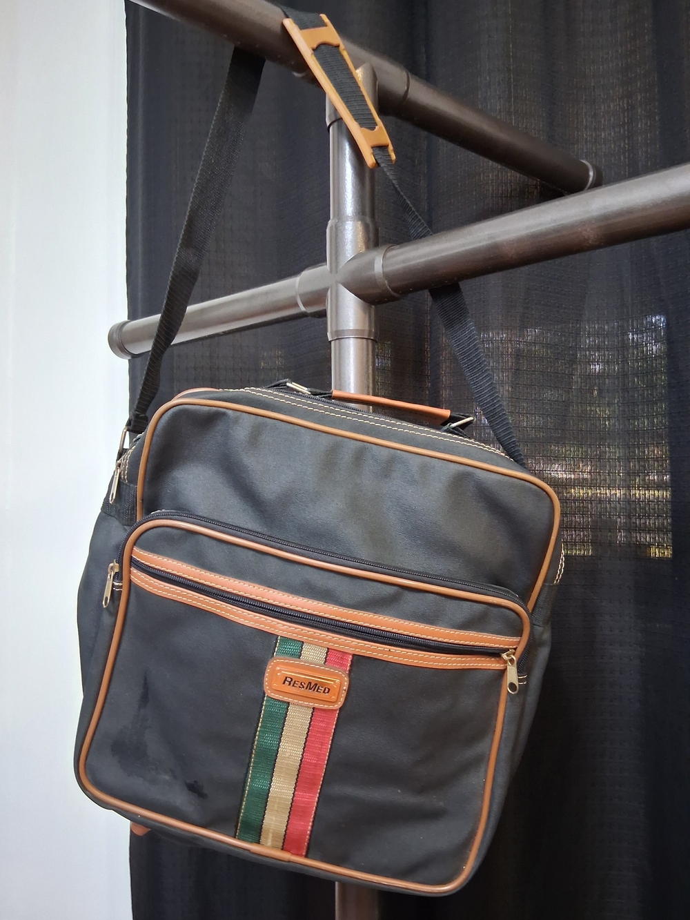 ResMed Black Messenger Bag with Tan Trim and Stripe Accent